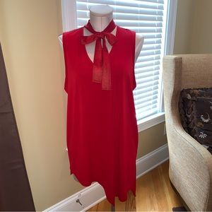 NWOT - Rafaella Lovely Short Sleeve Blouse with Asymmetrical bottom. Size Large